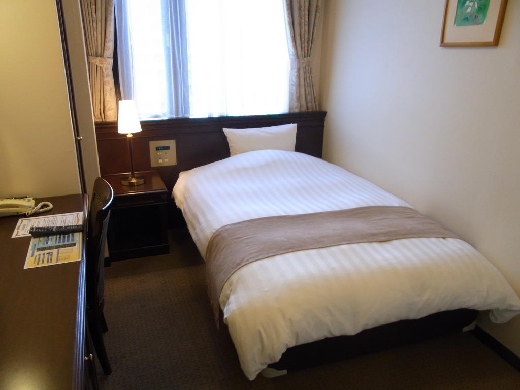 Amami Sunplaza Hotel Zimmer foto