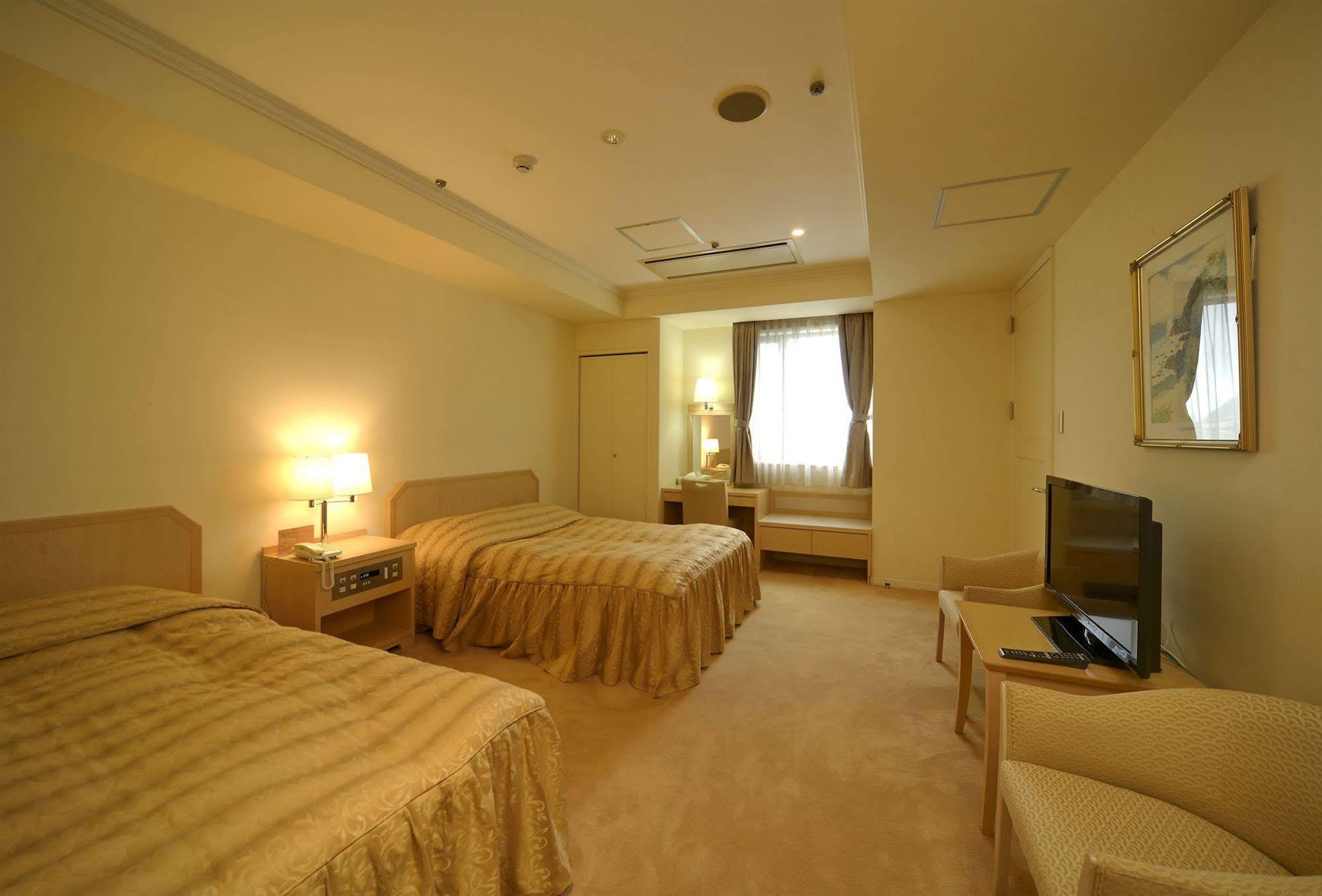 Amami Sunplaza Hotel Exterior foto